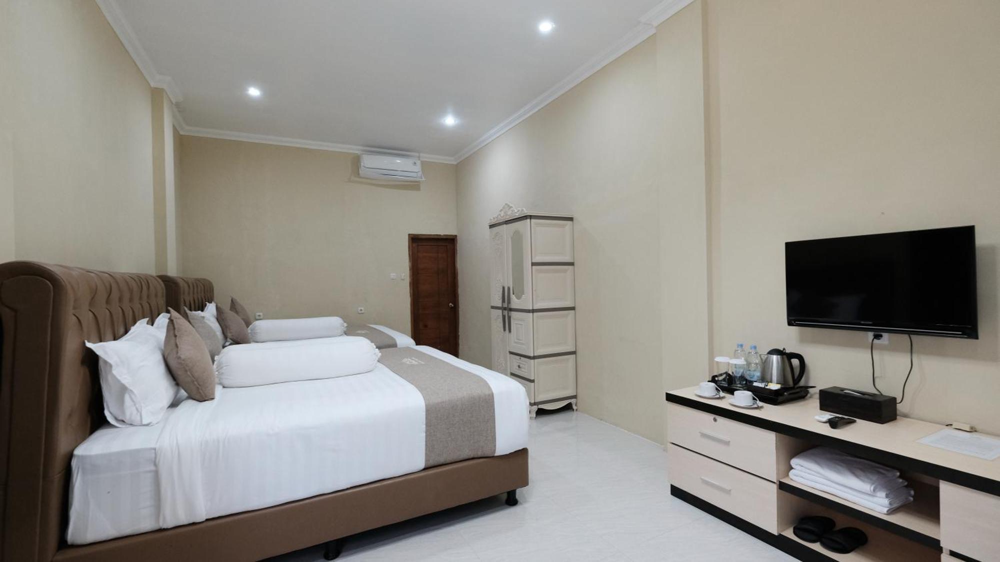 Bukit Indah Doda Hotel & Resorts Palu Quarto foto