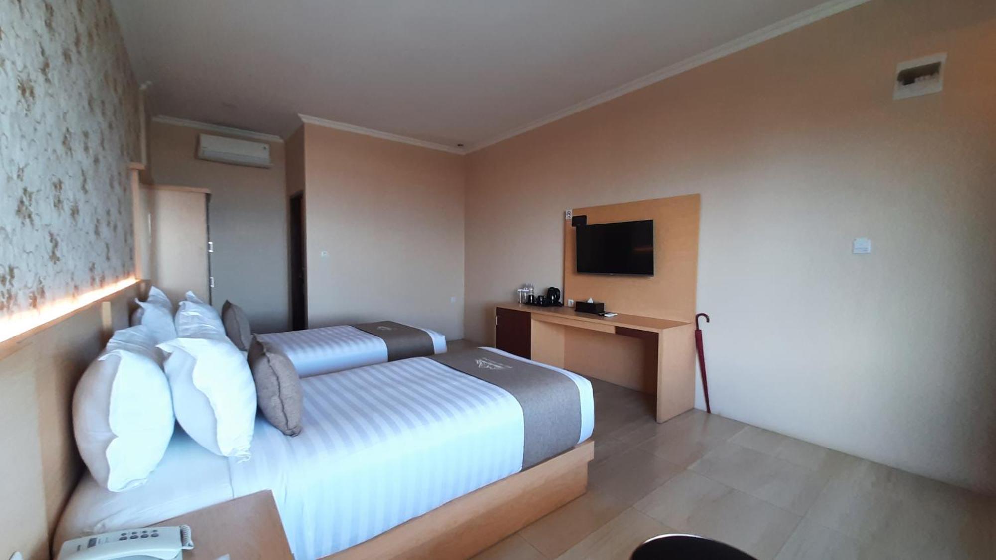 Bukit Indah Doda Hotel & Resorts Palu Quarto foto